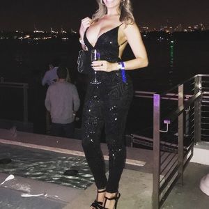 Black sequin Romper with open back and deep V